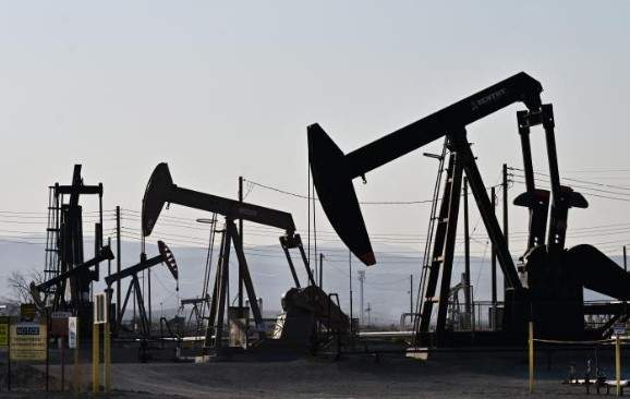 Oil prices hold steady at $90 a barrel as Wall Street weighs GDP impact